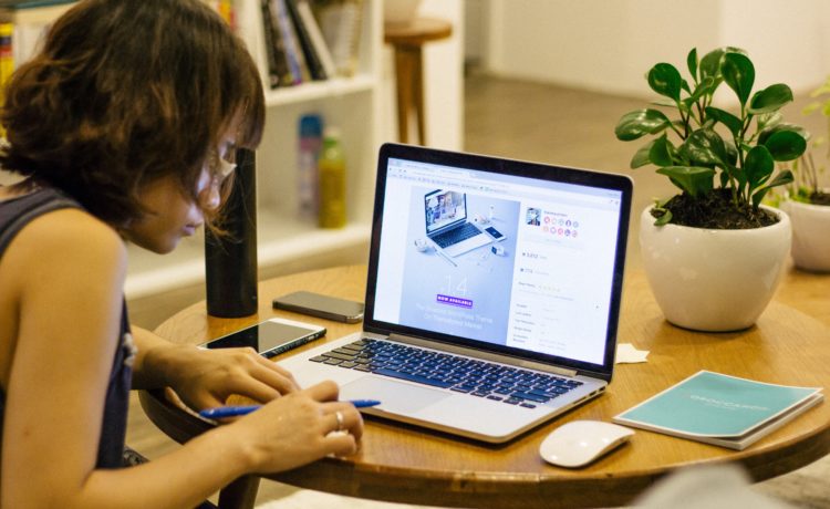 woman side hustle entreprenuer working computer